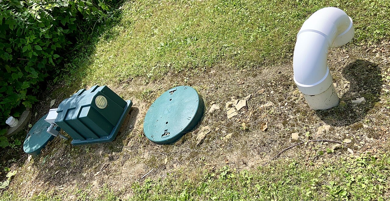 Septic tank access and piping before cover